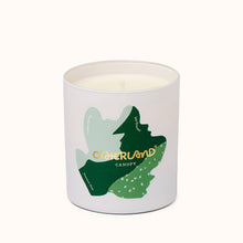 Canopy candle in a container with a green leaf design and 'Otherland' branding on a white background