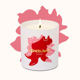 Candle with a red and pink design on a white background