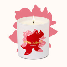Candle with a red and pink design on a white background