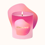 Pink candle with a gradient design and 'Otherland' branding on a white background