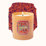 Candle with a colorful label on a white background