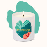 Otherland candle with colorful label on a white background