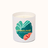 Otherland candle with colorful label on a white background
