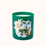 Green candle with floral design and 'Otherland' text on a white background