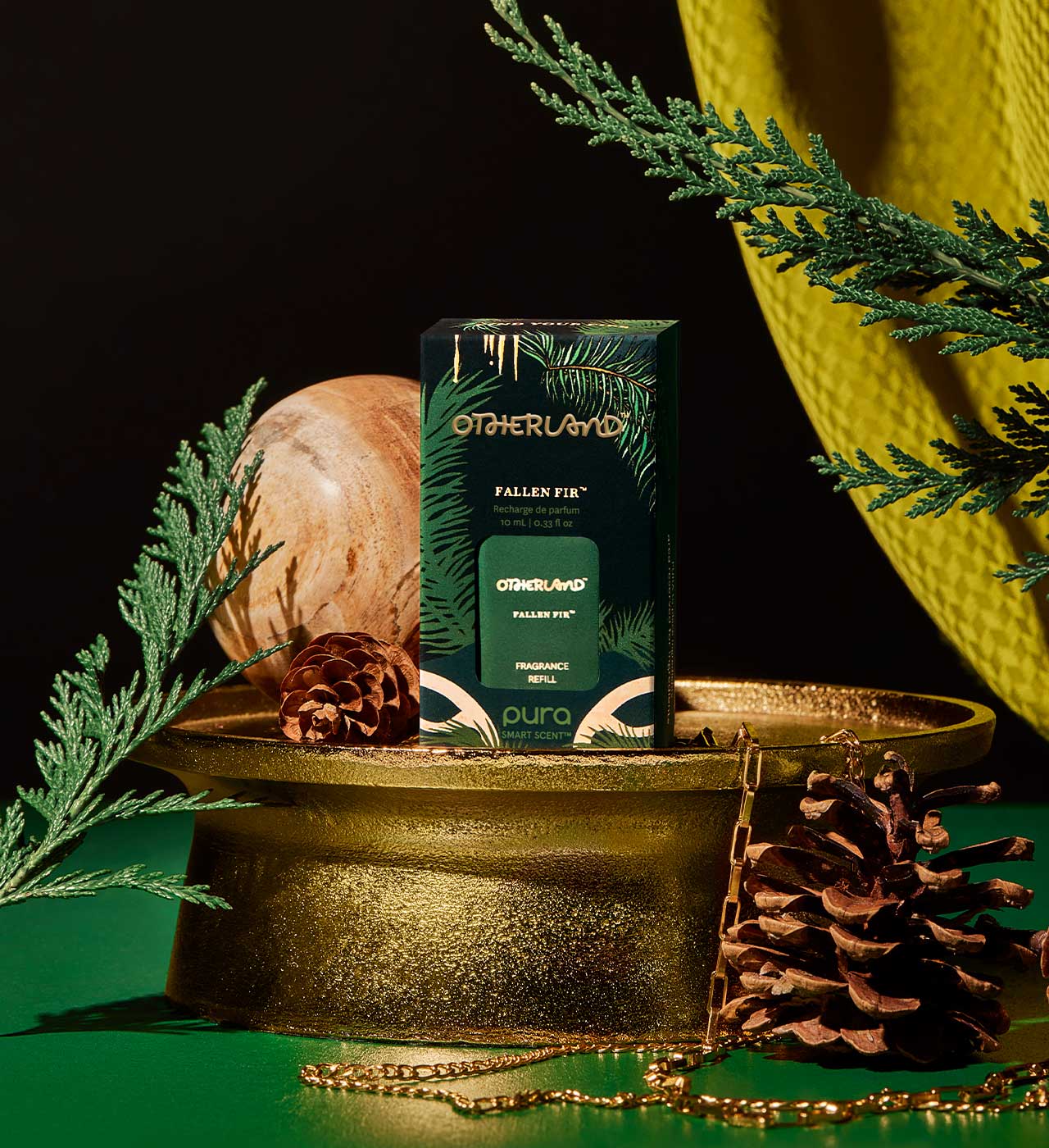 Otherland Fallen Fir product packaging with decorative elements on a dark background - View 2