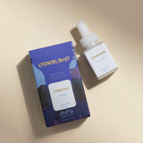 Otherland perfume bottle and packaging on a beige background