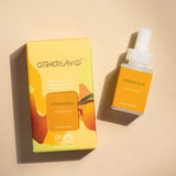 Otherland Nectar Pop fragrance set with packaging and bottle on a beige background