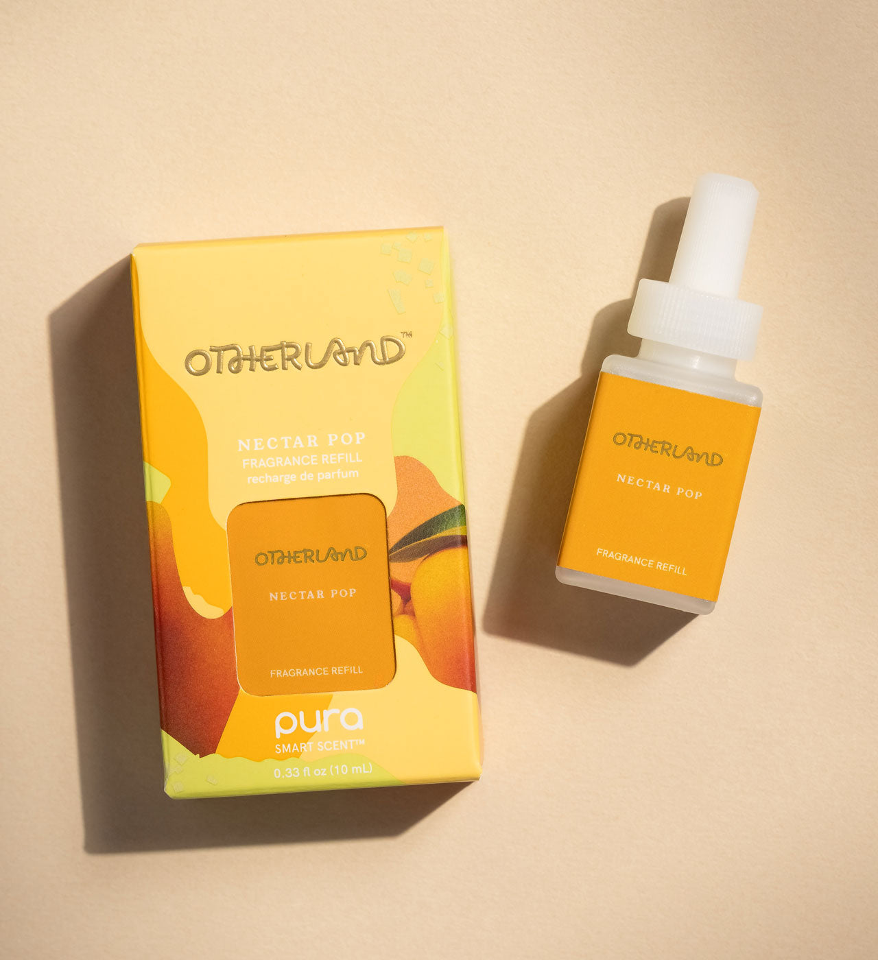 Otherland Nectar Pop fragrance set with packaging and bottle on a beige background - View 4