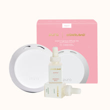 Pura smart fragrance diffuser set with pink packaging on a white background