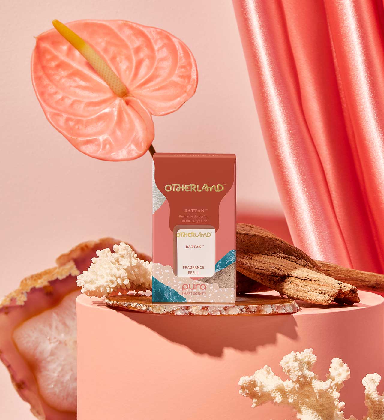 Otherland perfume bottle with pink anthurium flower and coral background - View 2