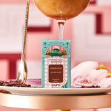 Pura smart fragrance refill packaging with a glass of coffee and ice cream on a pink background